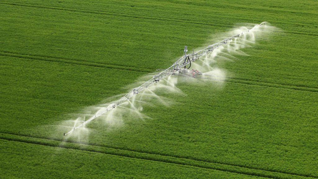 Aerial shot of drones detecting irrigation system.