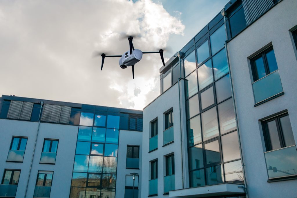 Drone inspecting school building.