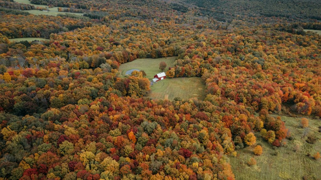 A scenic aerial shot of a countryside property that showcases how drones can help sell your property faster