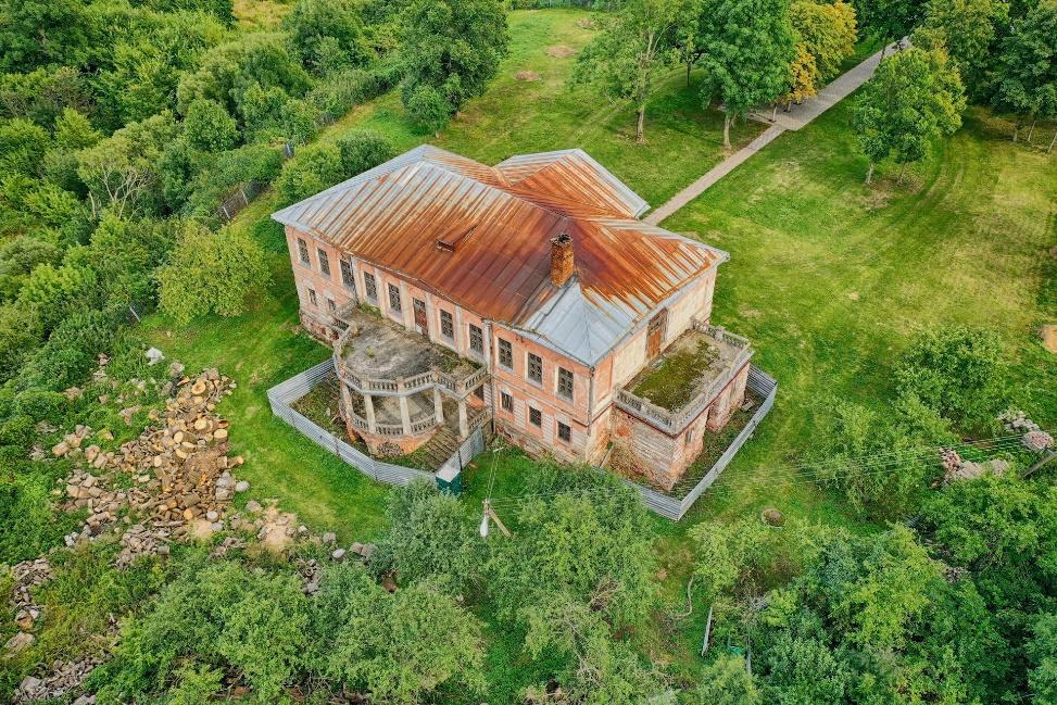 Aerial shots of a home in very rough shape