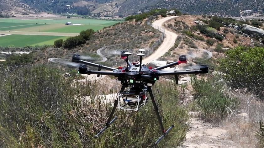 Drone flying over landscape