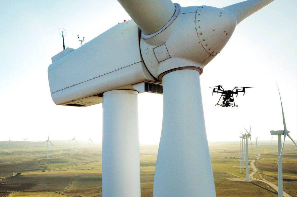 Drone Inspecting Wind Turbine